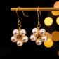 Pearl Wound Plum Blossom Gold-plated Ear Hooks